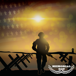 Soldier standing in the sunset