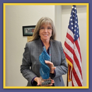 Judge Master, Jurist of the Year Award 2021, holding her award